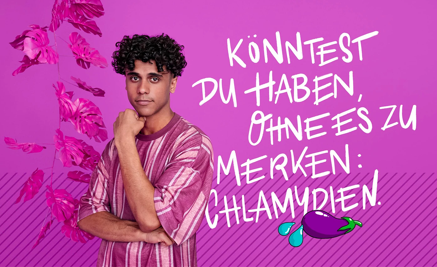 A young man stands in front of a purple background and looks thoughtfully at the viewer. He has his hand on his chin. To his right is the slogan "You could have it without realizing it: chlamydia."