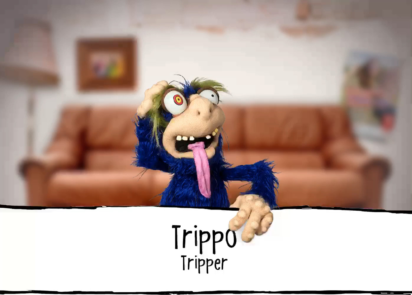 An animation in which a couch can be seen in the background. In front of it, the five puppets of the infectastic STI fly through the picture one after the other from right to left.